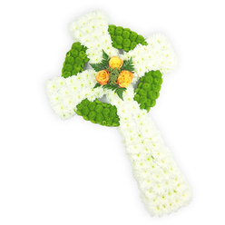 Viewed slightly from above on a stark white field, this carefully composed floral Celtic cross feels both contemporary in its clarity and timeless in its symbolism. The structural surface is formed from dense clusters of snowy white spray chrysanthemums; their tiny, feathered petals overlap to produce a velvety, reverent plane along each arm and the descending shaft. Contrasting sections of vivid apple-green button chrysanthemums are woven into the design with precision-defining the circular centre knot of the cross and punctuating alternating areas of the horizontal arms-so that the green serves as both outline and subtle pattern, adding depth and tactile interest. Nestled at the heart where the arms join, three radiant orange roses-more honeyed than bright, with warm amber undertones-create a luminous centre, their fuller petals giving a human, comforting focal point. A few sprigs of deep green foliage, possibly fern or similar fronds, cradle the roses and provide a gentle natural frame that heightens their glow. The arrangement sits in softly diffused light that highlights petal edges and the three-dimensional form, and the composition suggests a quiet scent of rose warmth blended with the clean, green notes of chrysanthemums. Intended as a sympathy tribute or funeral piece, its palette and iconography quietly recall Irish and Celtic connections without being florid-an approach many families in Golders Green and nearby Finchley Road favour when they want a memorial that is both elegant and heartfelt. The craftsmanship shows an experienced hand: measured curves, balanced colour rhythm, and an overall dignity appropriate for remembrance.