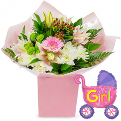 In this image, a carefully arranged new baby girl floral gift takes centre stage, set against a pure white backdrop that enhances every pastel shade and glossy leaf. The composition is built around a tall, square, light pink gift box, from which a generous bouquet of fresh flowers spills upward in a full, rounded shape. A single bright pink Gerbera daisy, with its open face and layered petals, draws the eye first, symbolising happiness and new beginnings. It is encircled by clusters of clean white chrysanthemums and elegant alstroemeria lilies whose pale pink and white petals are flecked with fine speckles, giving the arrangement a painterly, almost hand-illustrated charm. Nestled among them are creamy yellow lily buds, still tightly closed, echoing the sense of quiet anticipation that surrounds a newborn. Vivid lime-green button blooms add a modern twist and textural interest, while small sprays of deep red hypericum berries lend warmth and richness. The flowers are supported by an abundance of dark green, broad leaves and feathery fern fronds, which curve softly around the edges, creating a natural frame and hinting at the expert touch of a local Golders Green florist. All of this is wrapped in soft, ballet-pink tissue and a layer of clear cellophane, cradling the stems neatly into the box and suggesting a bouquet ready for doorstep delivery along Golders Green Road or near Hampstead Garden Suburb. Hovering just to the right, a shiny pink foil balloon in the shape of a baby pram completes the story. Its purple hood and wheels, with multicoloured spokes, surround the joyful message "It's a Girl!" written in playful yellow and green lettering. Small decorative hearts and the metallic sheen give the balloon a fun, party-ready feel, making the entire scene ideal for celebrating a baby shower, a hospital homecoming, or a first welcome home in NW11.