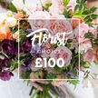 A sumptuous hand-tied bouquet fills the frame, captured in soft morning light that reveals velvety textures and layered petals. At the heart of the arrangement sit large, blushing garden roses in shades of pale pink and soft peach, their ruffled centers opening like vintage lace; nearby, deep plum-hued hellebore-like blooms create rich contrast and a smoky, romantic depth. Delicate striped sweet peas-pale purple with fine white banding-trail among the roses, adding a whisper of perfume and an almost translucent, paper-thin softness. Peach and coral ranunculus or similar layered blooms lend warmth and sculpted form, while small creamy white accents catch the light and lift the palette. Abundant, varied greenery-slender trailing vines, eucalyptus-like leaves and broader matt greens-wrap the flowers in a natural, garden-style embrace, providing air and movement between the blooms. Centrally superimposed on the image is a crisp white rectangular frame bearing the elegant script words Florist Choice with the smaller uppercase CHOICE beneath and a bold ?100 at the bottom, clearly indicating the florist-selected offering and price. A pair of hands gently cradles the trimmed stems at the base of the bouquet; the holder's light, blurred clothing gives a human scale and a reassuring, personal touch. The whole composition reads as a bespoke, artisan gift-sumptuous and considered-suitable for anniversaries, weddings, or a thoughtful celebration. A viewer can almost smell the faint sweetness of rose and sweet pea and feel the soft, layered petals under fingertips, a testament to the floral craft and seasonal selection typical of a local Golders Green florist familiar with neighbourhood tastes.