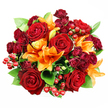 Viewed directly from above against a pristine white backdrop, this lush, circular bouquet reads like a warm, tactile painting. Large, fully opened deep red roses form the central chorus, their velvety petals unfurling to reveal layered, intricate centers that speak of classic romance and quiet intensity. Between them, fiery orange Asiatic lilies punctuate the composition with trumpet-shaped blooms and prominent stamens-some blossoms wide and declarative, others in the soft suspense of a half-unfurled petal or tight bud-creating movement and a sense of unfolding drama. Clusters of smaller, deep burgundy spray roses nestle close to the larger flowers, their compact, multi-petalled heads adding velvety density and a jewel-toned counterpoint that deepens the palette. Glossy ruby Hypericum berries scatter like tiny, polished beads across the surface, catching the light and offering playful textural contrast to the soft petals. Fresh green foliage-broad, glossy leaves resembling ruscus or salal-peeks through the blooms, framing the reds and oranges with a cool, verdant breath that balances the arrangement. The soft, even lighting flattens shadows gently, allowing every curve and surface to read clearly in tactile terms: slick berry skins, plush rose petals, papery lily lobes, and smooth, cool leaves. There is a compelling scent suggestion here-rose's classic depth mingling with the lilies' spicy-citrus thread-so the bouquet feels both opulent and approachable. A design like this, with its autumnal reds, sunlit oranges, and garden greens, suits anniversaries, heartfelt thank-yous, or an intimate celebration at home near Golders Hill Park or along Golders Green Road, where local delivery keeps the freshness true to the moment.