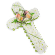A solemn yet tender floral cross is shown isolated against a pure white background, its balanced shape and careful craftsmanship drawing the eye. The cross is sculpted entirely from a dense blanket of white chrysanthemums, each tiny flower head pressed closely to the next, forming a smooth yet softly textured surface that suggests peace and stillness. This pure white field, unbroken across the length of the vertical and horizontal arms, evokes a sense of quiet reverence. Around the outer edge, a slim trimming of fresh green foliage and supportive floral materials traces the outline, providing a clean border that gives the design definition and structure. At the point where the arms of the cross meet, a small yet expressive spray of larger blooms creates a focal accent. Several roses in gentle shades of peach, apricot, and creamy ivory nestle together, their open petals adding warmth and a human touch to the design. Wisps of slender green grass and feathery fern fronds extend outward from the roses, while tiny purple filler flowers are tucked among the greenery, creating delicate points of colour amid the whites and greens. The lighting is bright and even, making every petal edge and leaf vein visible without distraction. This floral cross feels perfectly suited to a funeral service in Golders Green, whether placed beside a casket, at the front of a chapel, or taken on to a graveside farewell after a local service. It visually conveys sympathy, faith, and loving remembrance, offering gentle comfort during a time of loss.