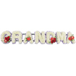This elegant funeral flower tribute spells out GRANDMA in large, freestanding letters, photographed against a simple white background that highlights every detail of the design. Each letter is fully covered in pristine white cushion chrysanthemums, their compact, rounded blooms fitted closely together so the surface appears dense, plush, and softly textured, like a comforting blanket of petals. Around each letter, a fine border of soft lavender or pale purple ribbon creates a gentle halo effect, adding depth and a hint of colour without disturbing the overall sense of peace. Vivid red floral accents are placed with care to express love and remembrance. The G is graced with a cluster of velvety red roses and an eye-catching red-and-white variegated calla lily tucked into its curve, offering a focal point at the beginning of the word. The first A features a single, heart-shaped red anthurium at its base, its glossy, sculpted petals standing out boldly against the white flowers. The middle M repeats this accent with a grouping of deep red roses and another red anthurium, echoing the earlier flourish, while the final A carries one more anthurium to gently draw the eye to the end of the tribute. A dark green supporting frame, softened with touches of foliage, holds the letters securely and in perfect alignment. Thoughtfully designed for services and burials around Golders Green, this floral lettering offers a personal, heartfelt farewell to a much-loved grandmother, capturing both the purity of white sympathy flowers and the enduring warmth of red blooms.
