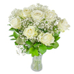 A serene, impeccably arranged bouquet of approximately twelve pristine white roses and clouds of airy baby's breath (Gypsophila) sits in a simple clear glass vase against a bright white backdrop, each element described as if by a local florist. The roses range from fully open, revealing layers of soft, creamy petals, to buds that are still gently unfurling, creating a subtle sense of motion and life. Tiny, star-like sprays of baby's breath weave between the larger blooms, lending an ethereal, lace-like texture that softens the composition and gives the arrangement a misty, almost snowfall quality. Deep emerald to lighter lime green foliage frames and supports the flowers, their glossy leaves adding structure and a fresh verdant contrast that enhances the clarity of the whites. The glass vase shows neatly trimmed green stems and a visible water line, a quiet testament to freshness and careful handling. Diffused, natural light picks out the satin sheen of the petals and the delicate shadows between them, making the bouquet feel calm and luminous.

Emotionally, this display speaks of purity, consolation, and refined celebration - suitable for a wedding table, an anniversary gift, or a thoughtful sympathy gesture. The faint, cool scent is suggested rather than overpowering, conjuring images of a morning stroll through Golders Hill Park or a peaceful corner of Hampstead Heath nearby. As a florist describing it to someone who cannot see it, I would note how the composition balances strength and tenderness: the round, full roses grounded by crisp greenery and lifted by the airy gypsophila, an arrangement that radiates quiet grace and gentle reassurance in every stem.